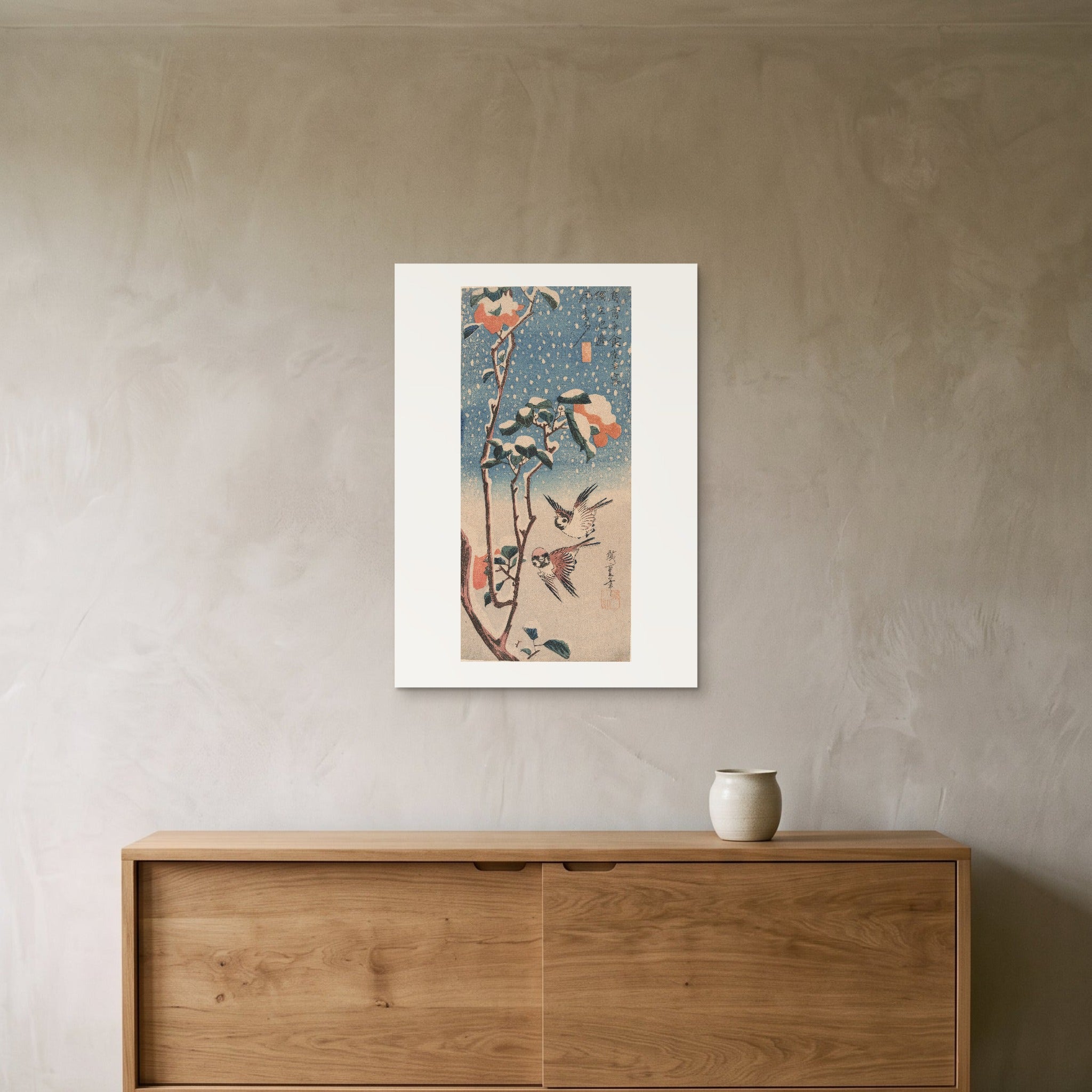 Hiroshige's Sparrows and Camellia in Snow as a 50 × 70 cm giclée print, unframed, hung 25 cm above a 140 cm sideboard