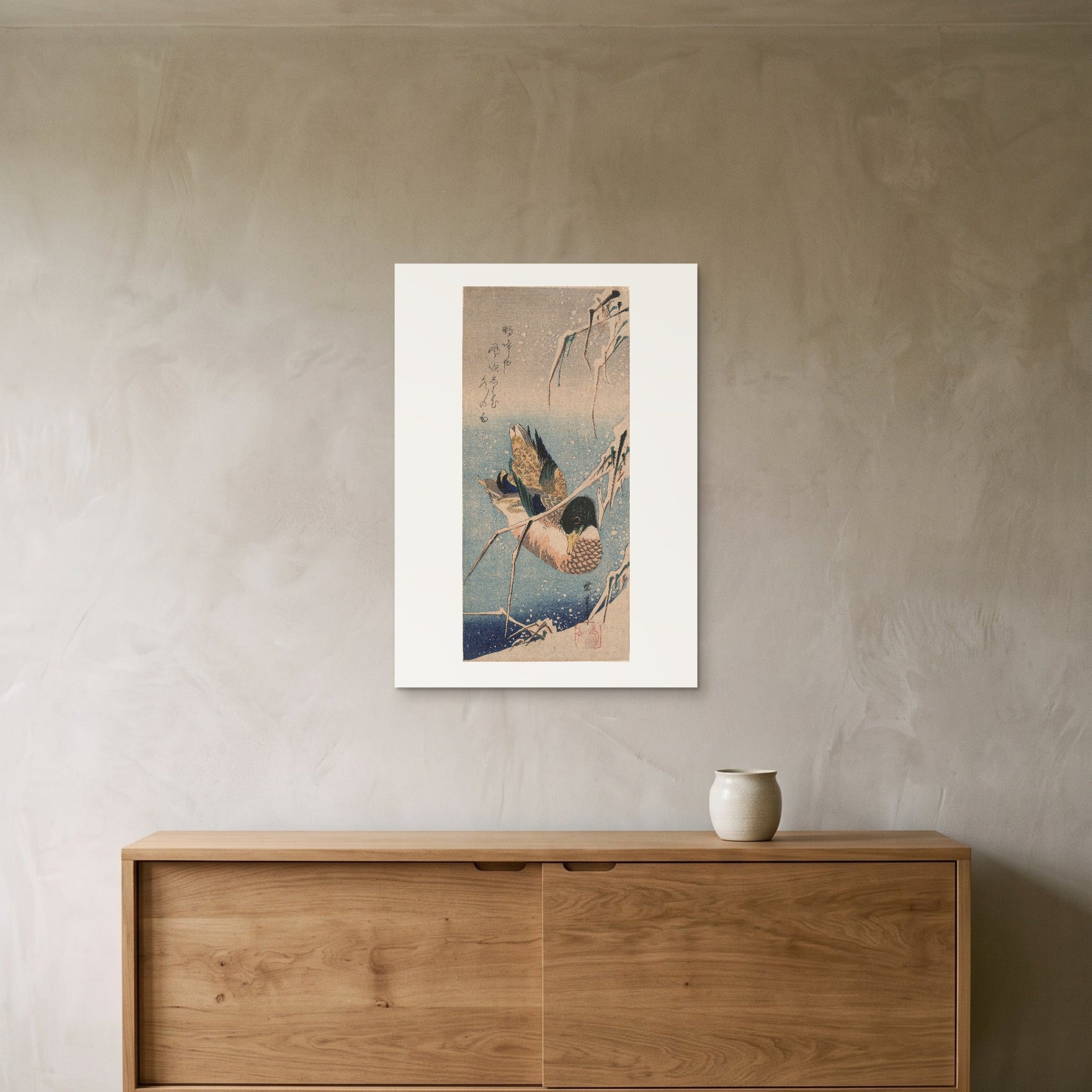 Hiroshige's Wild Duck in Snow as a 50 × 70 cm giclée print, unframed, hung 25 cm above a 140 cm sideboard