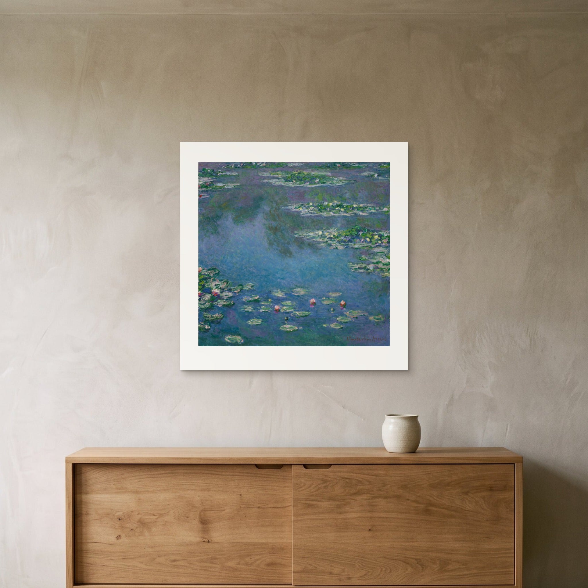 Monet's Water Lilies as a 70 × 70 cm giclée print, unframed, hung 25 cm above a 140 cm sideboard