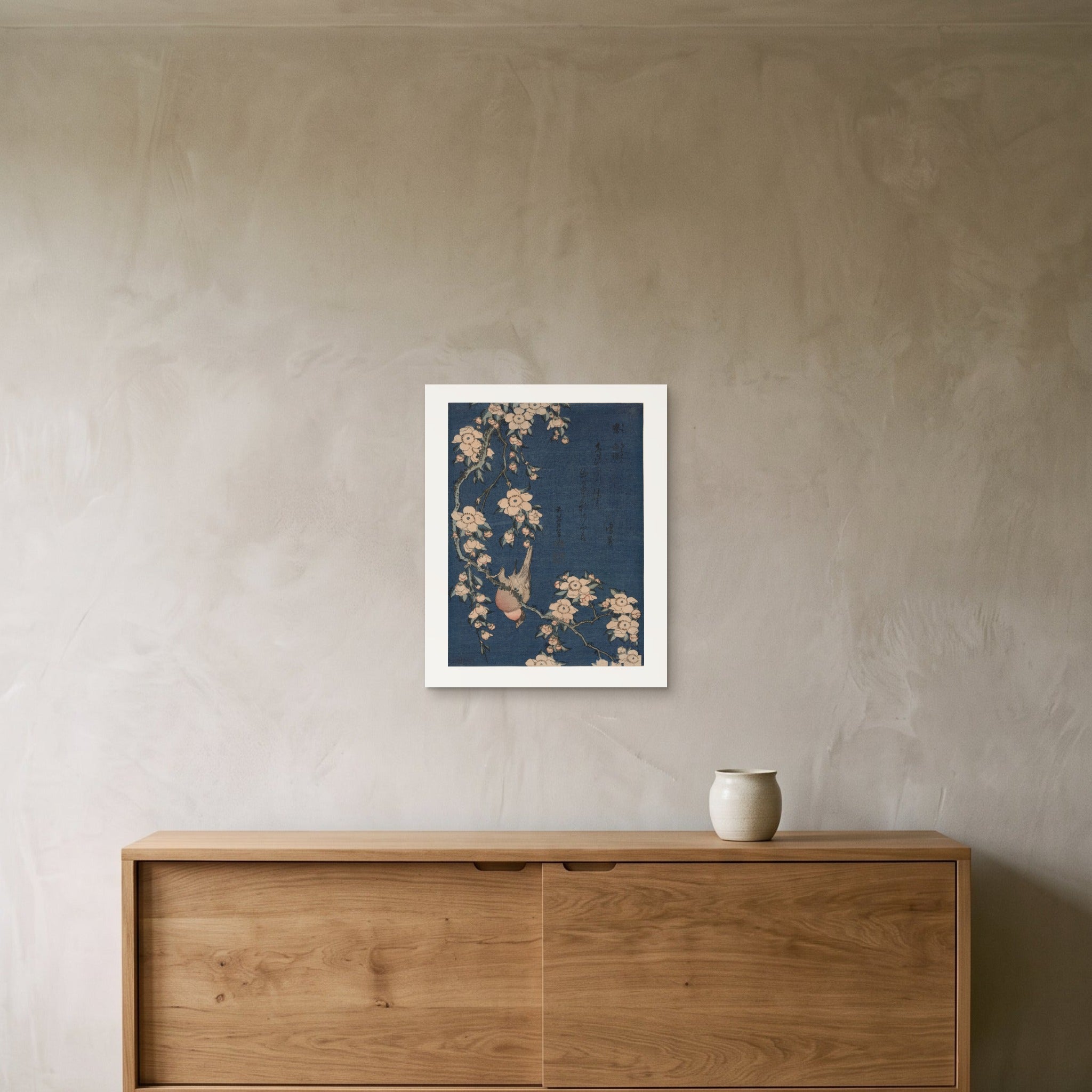 Hokusai's Bullfinch and Weeping Cherry as a 40 × 50 cm giclée print, unframed, hung 25 cm above a 140 cm sideboard