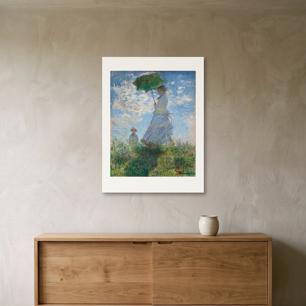 Monet's Woman with a Parasol as a 60 × 80 cm giclée print, unframed, hung 25 cm above a 140 cm sideboard