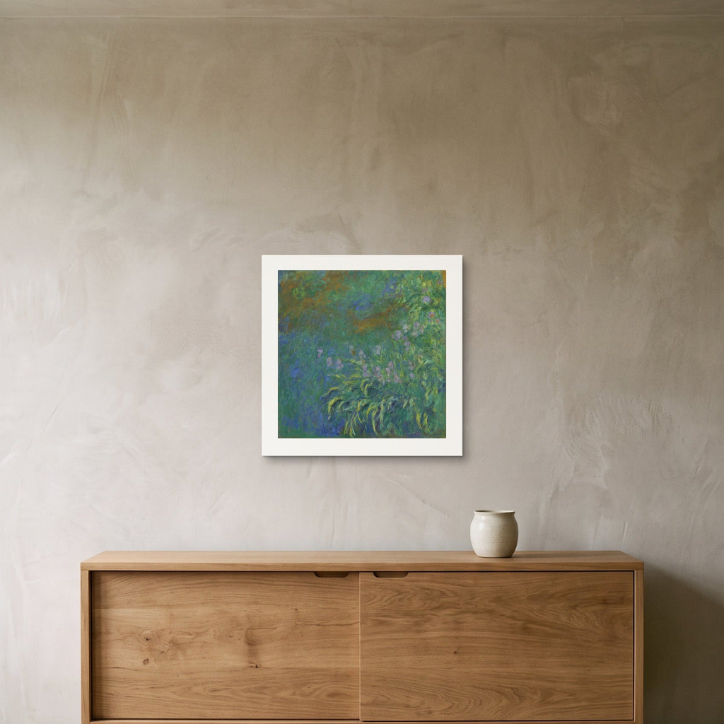 Monet's Irises as a 50 × 50 cm giclée print, unframed, hung 25 cm above a 140 cm sideboard