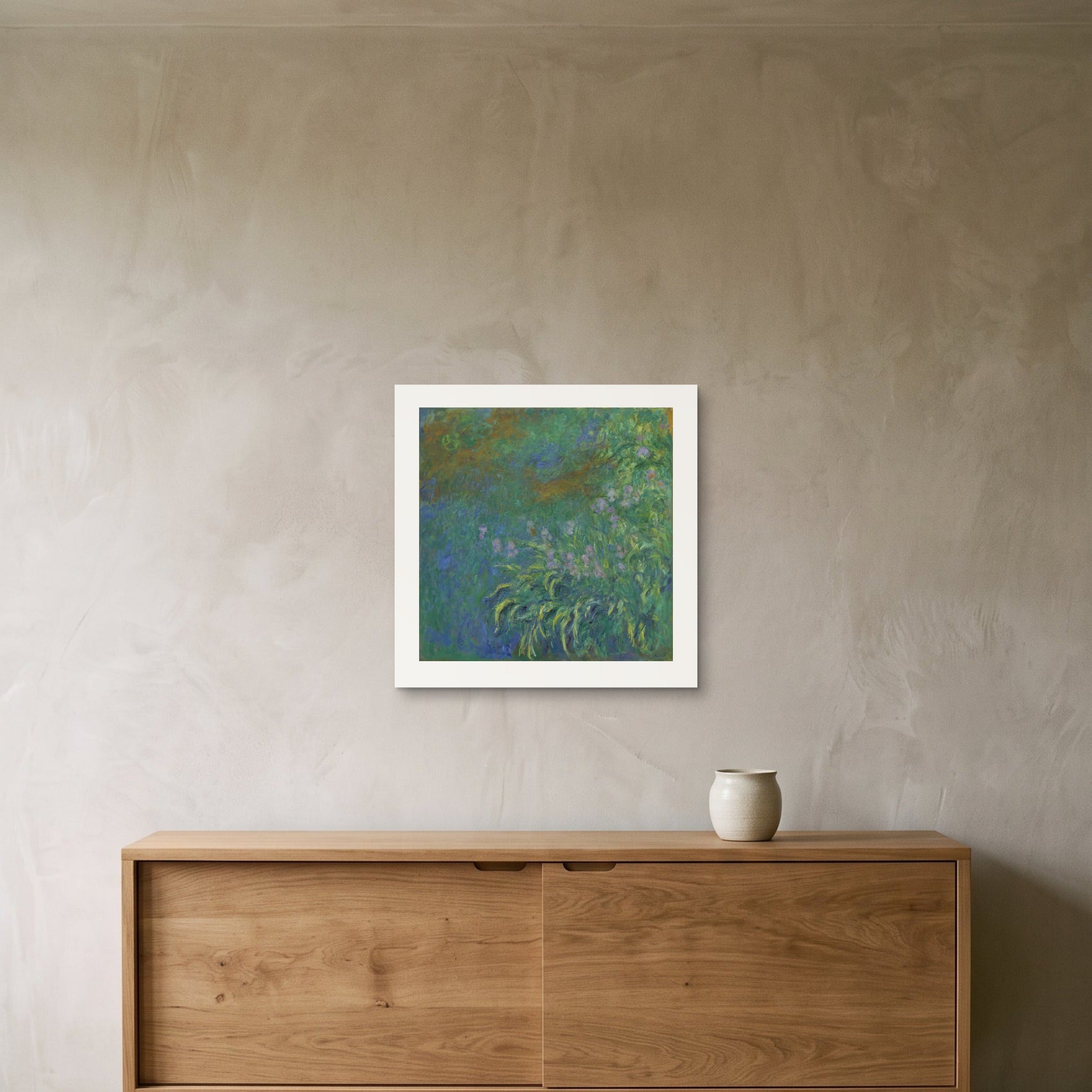 Monet's Irises as a 50 × 50 cm giclée print, unframed, hung 25 cm above a 140 cm sideboard