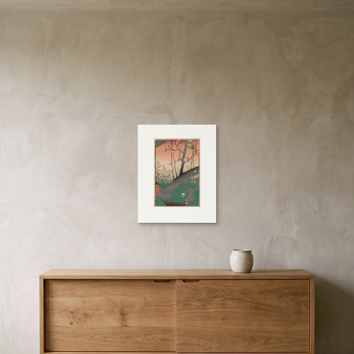 Utagawa Hiroshige – Plum Garden at Kameido, 1857 — the 40 × 50 cm sheet as printed, shown on the wall above a sideboard