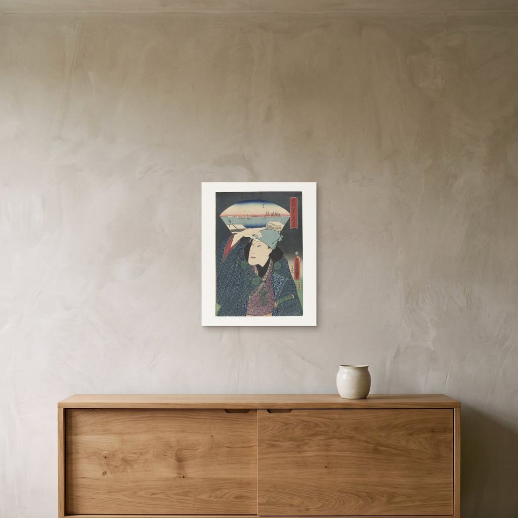 The 40 × 50 cm sheet framed above a sideboard