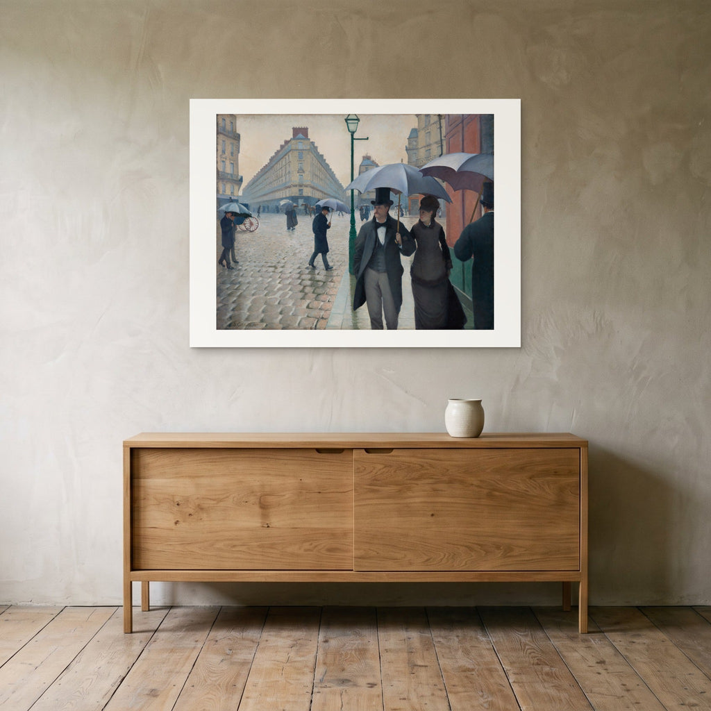 Caillebotte, Paris Street; Rainy Day — the 100 × 75 cm print hung above an oak sideboard