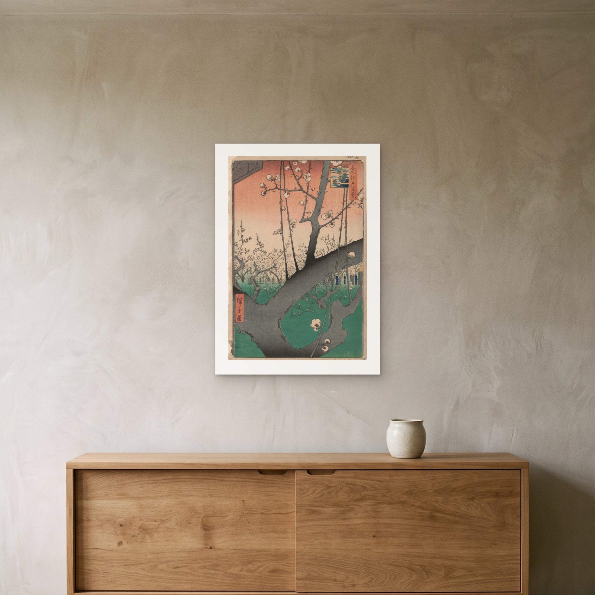 Hiroshige's Plum Garden at Kameido as a 50 × 70 cm giclée print, unframed, hung 25 cm above a 140 cm sideboard