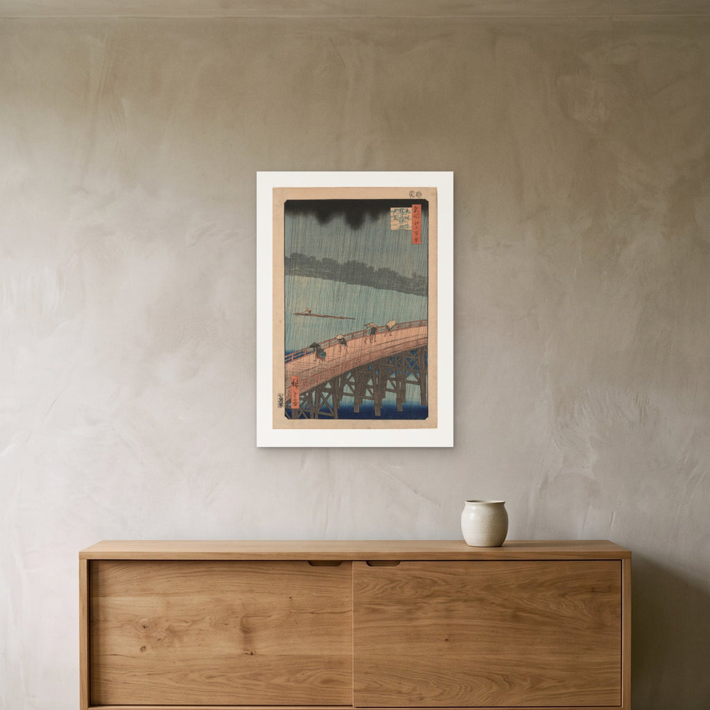 Hiroshige's Sudden Shower as a 50 × 70 cm giclée print, unframed, hung 25 cm above a 140 cm sideboard