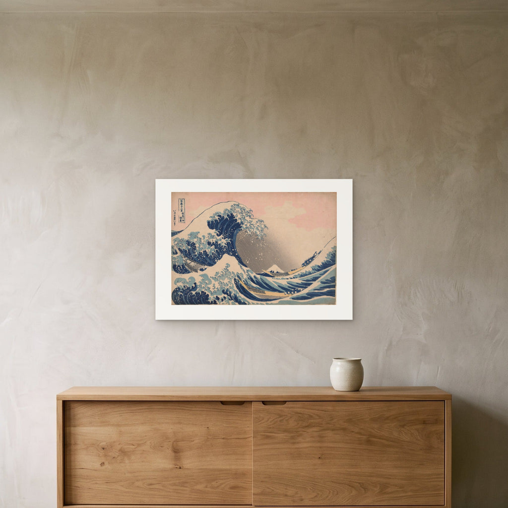 Hokusai's Great Wave as a 70 × 50 cm giclée print, unframed, hung 25 cm above a 140 cm sideboard