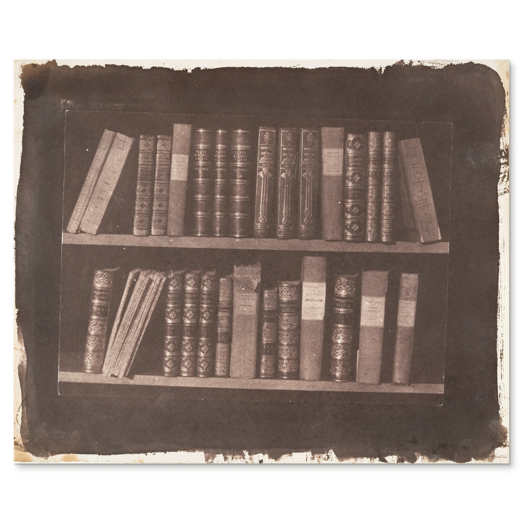 William Henry Fox Talbot, A Scene in a Library, 1844 - the whole salted paper sheet shown flat on white