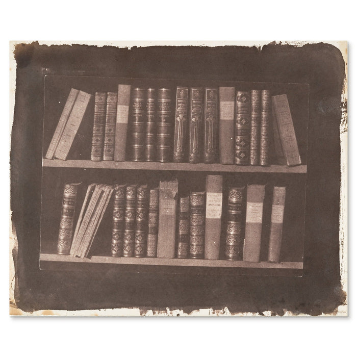 William Henry Fox Talbot, A Scene in a Library, 1844 - the whole salted paper sheet shown flat on white